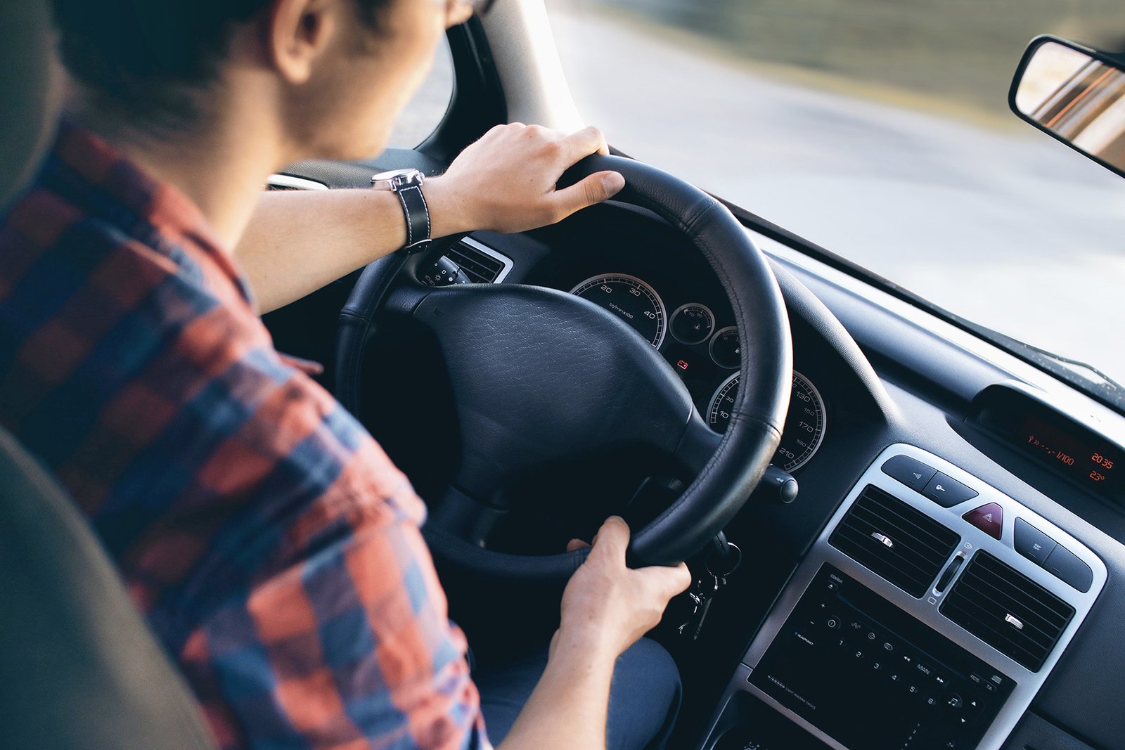 View from the passenger seat during a driving lesson